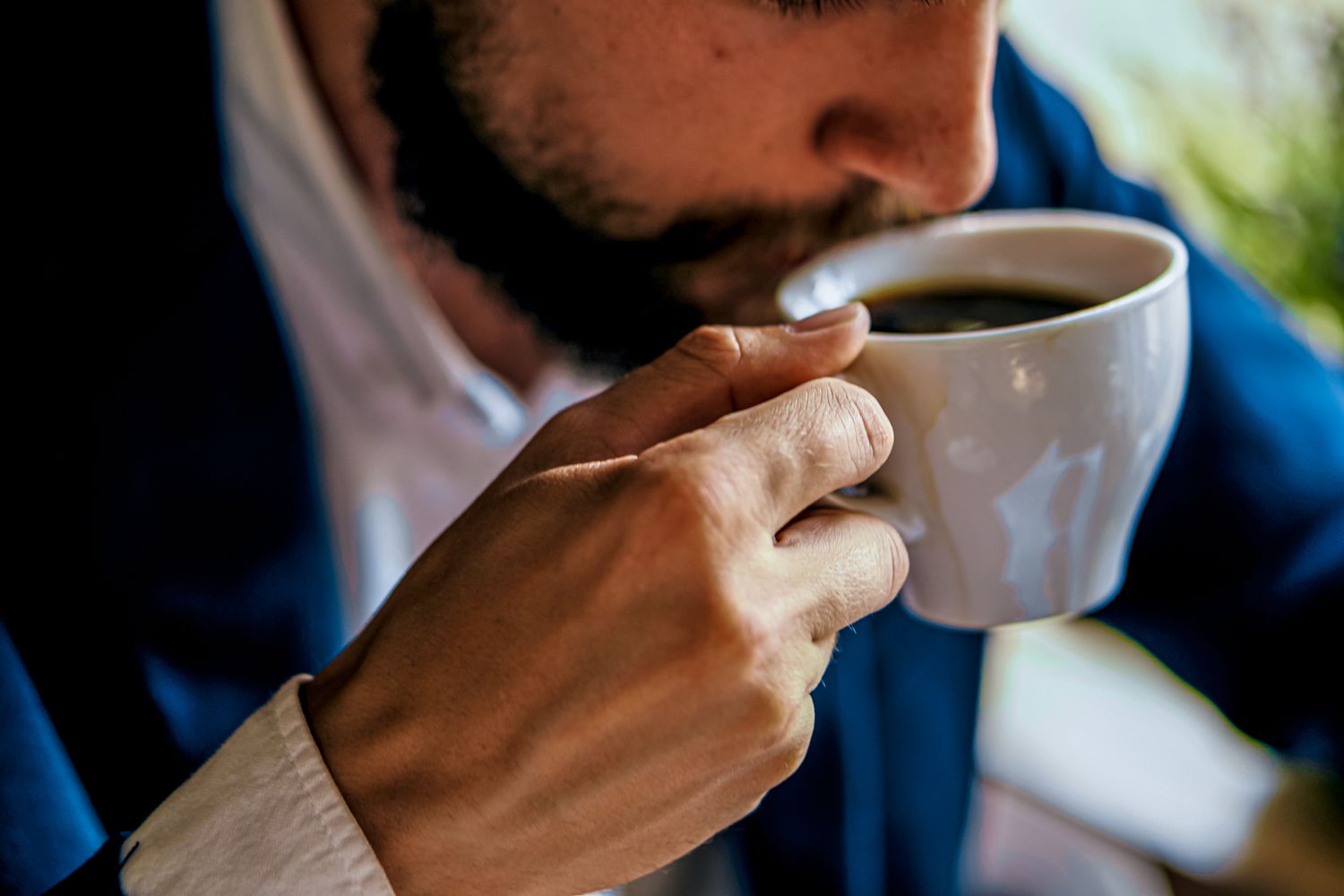 Business-Man-Drinking-Coffee