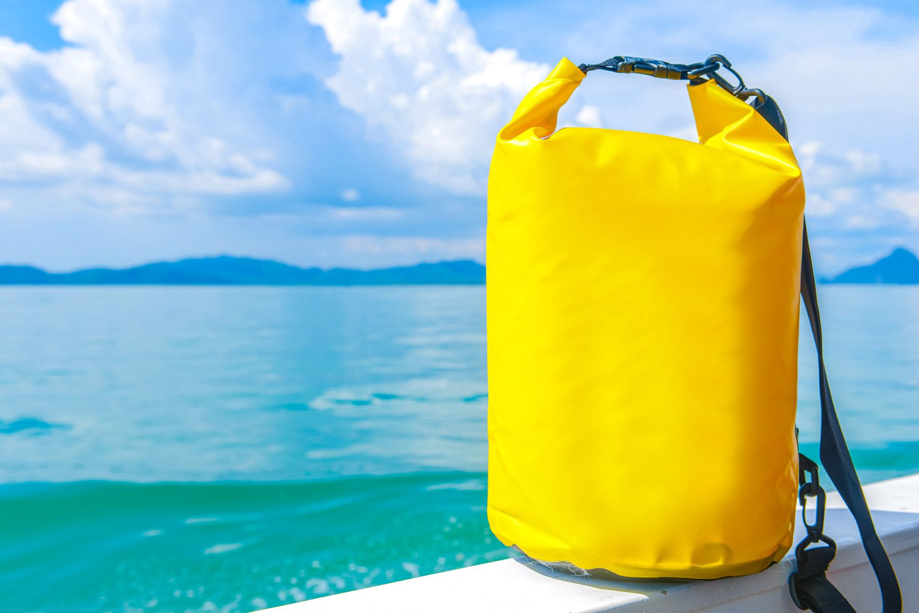 36-yellow-waterproof-travel-bag-at-sea